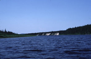 View of high sand terraces on Mishikamau-shipu at the outlet of Utshashku-nipi. Photo courtesy Moira McCaffrey.