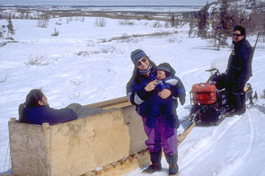 Nympha Byrne, André Rich (at snowmobile), and others on the way south to Ashuapun. Photo courtesy Peter Armitage.